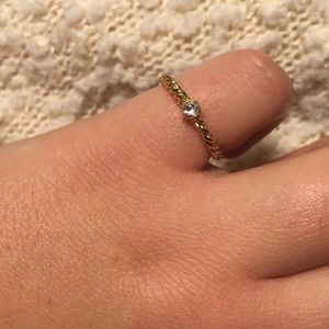 Twist pinky ring with small jewel